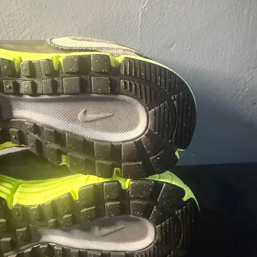 Nike women’s Gray and Neon Green Dual Fusion Sneakers